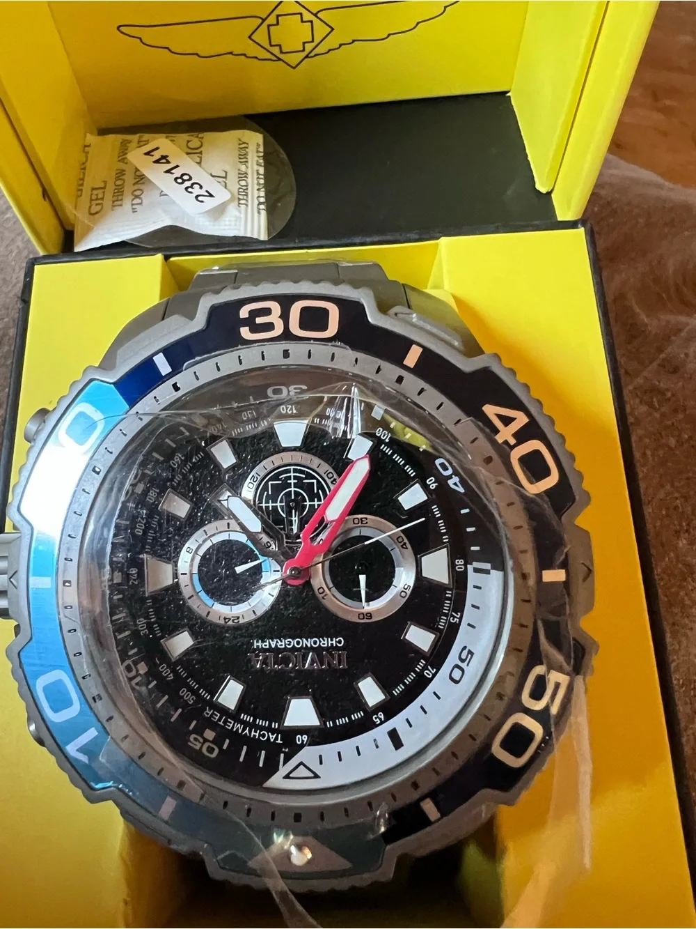 Invicta Men’s Black Dial Silver Case Chronograph Watch with Blue Accent